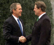 After a close campaign, Gore greets President-elect Bush at the White House in late December of 2000.